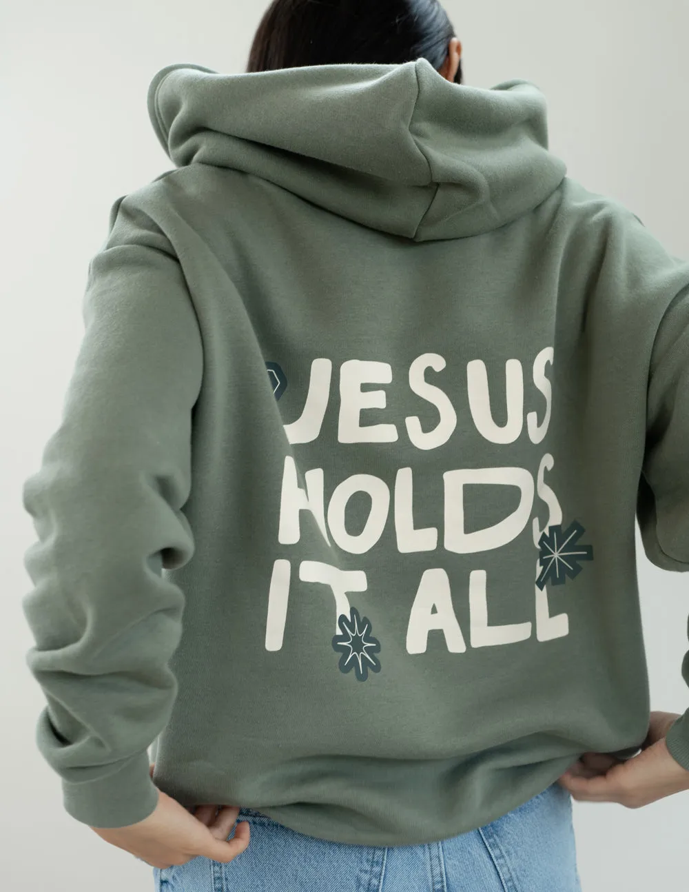 Jesus Holds It All Unisex Hoodie