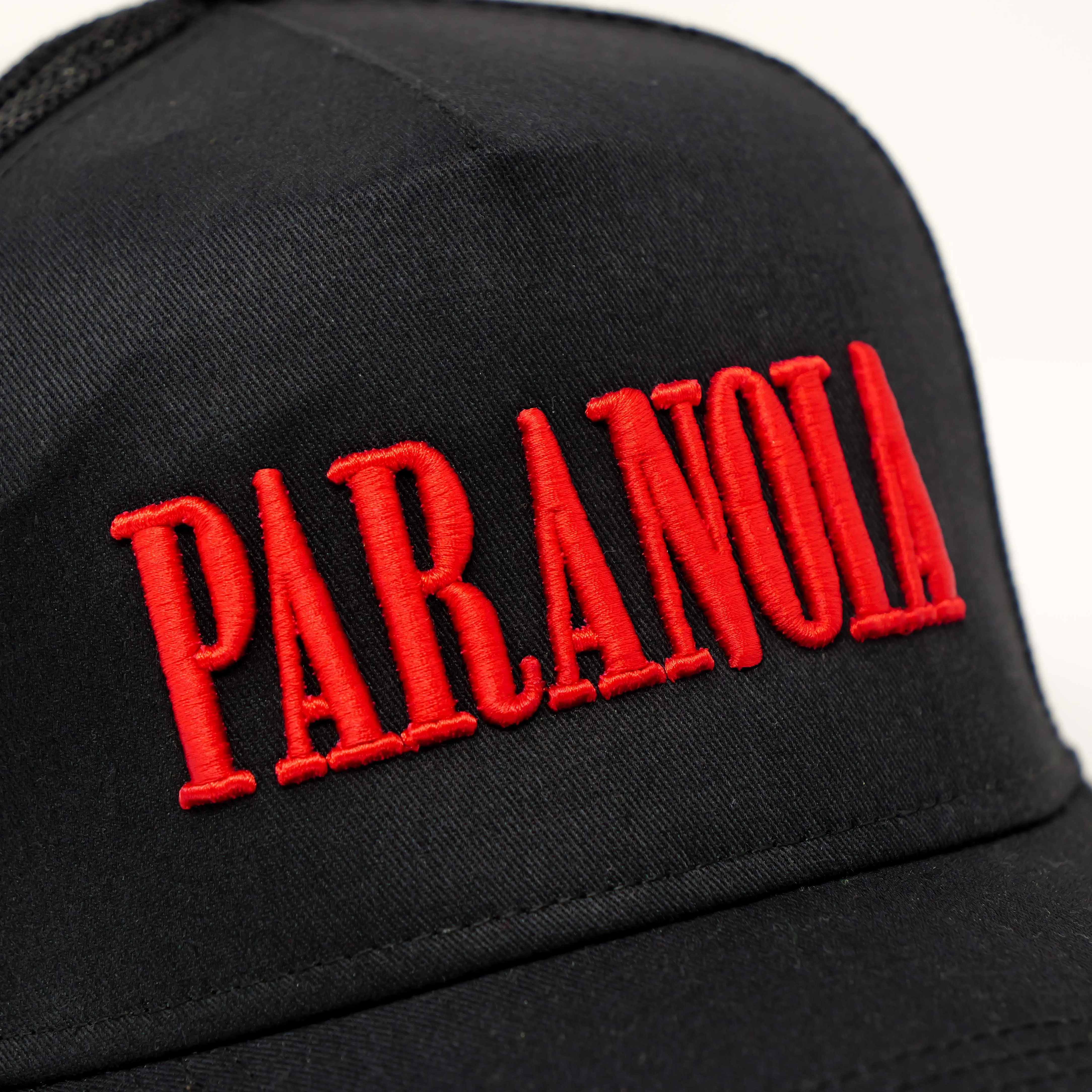 PARANOIA TRUCKER HAT BLACK/RED